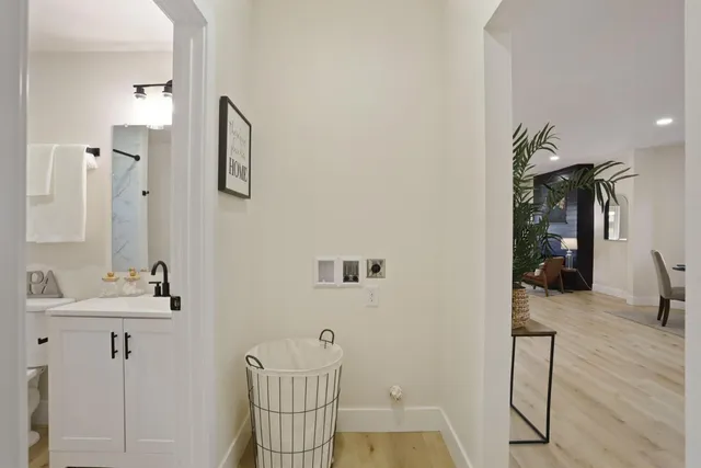 a bathroom with a toilet and shower