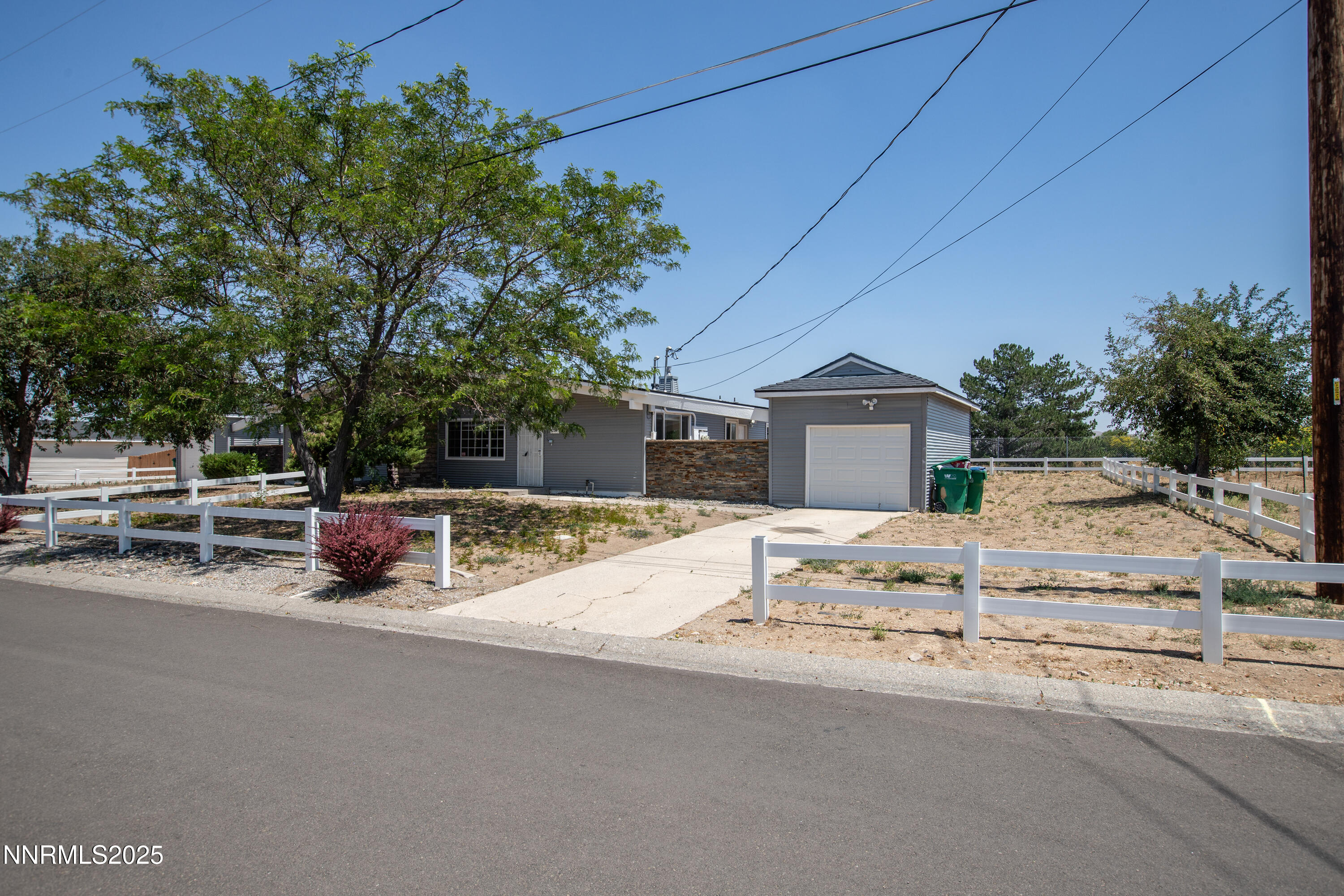 12190 Rocky Mountain Street Reno, NV 89506 - Photo 17 of 27 a view of a house with a outdoor space