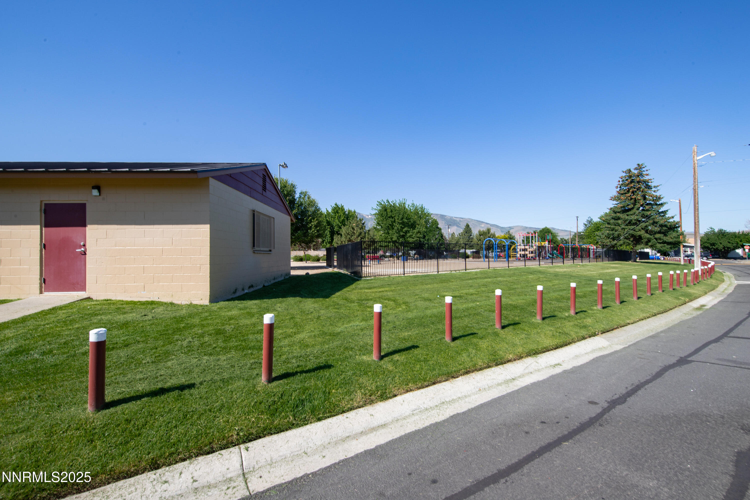 12190 Rocky Mountain Street Reno, NV 89506 - Photo 27 of 27 a view of a house with a yard