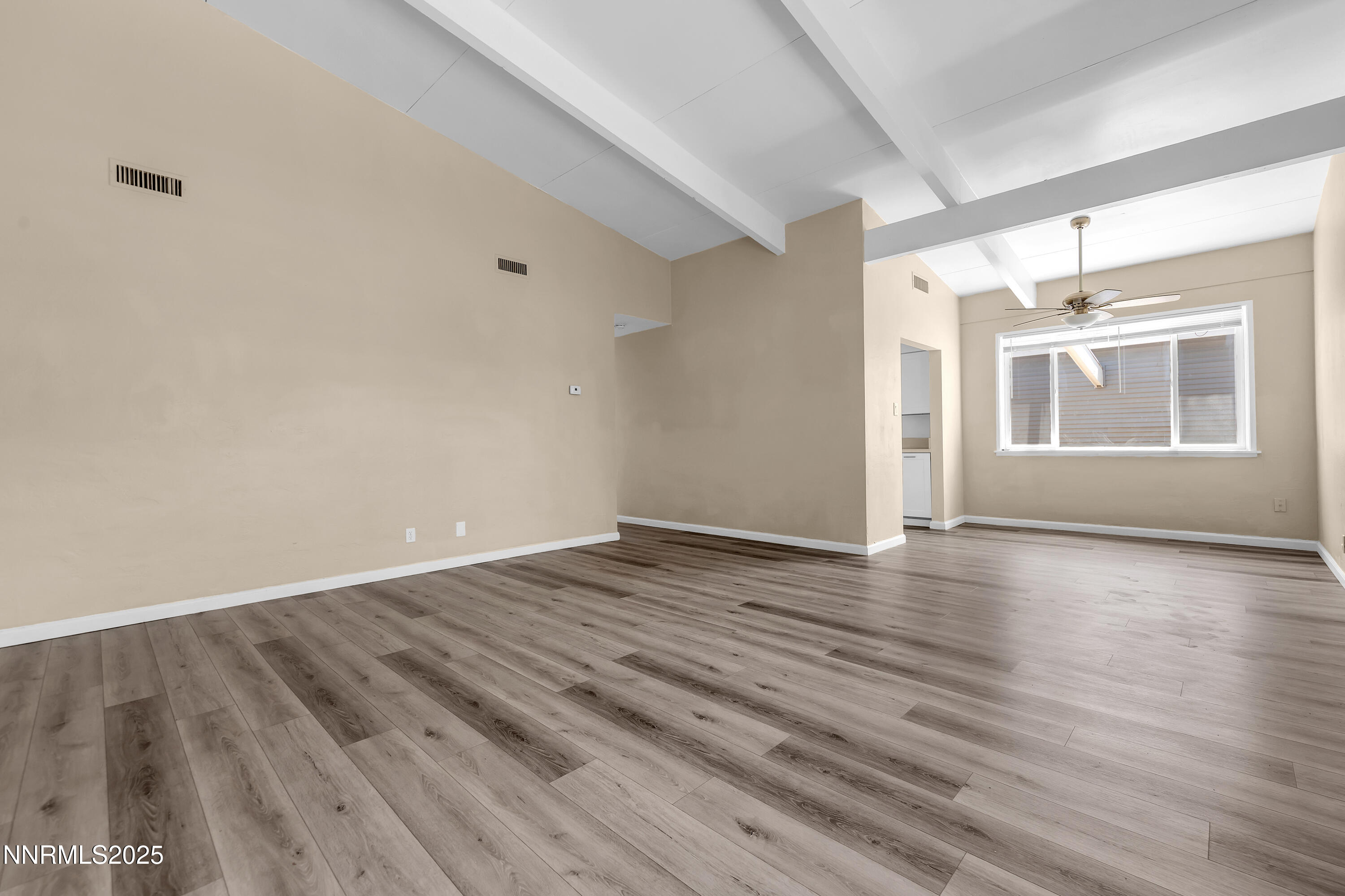 12190 Rocky Mountain Street Reno, NV 89506 - Photo 6 of 27 wooden floor in an empty room