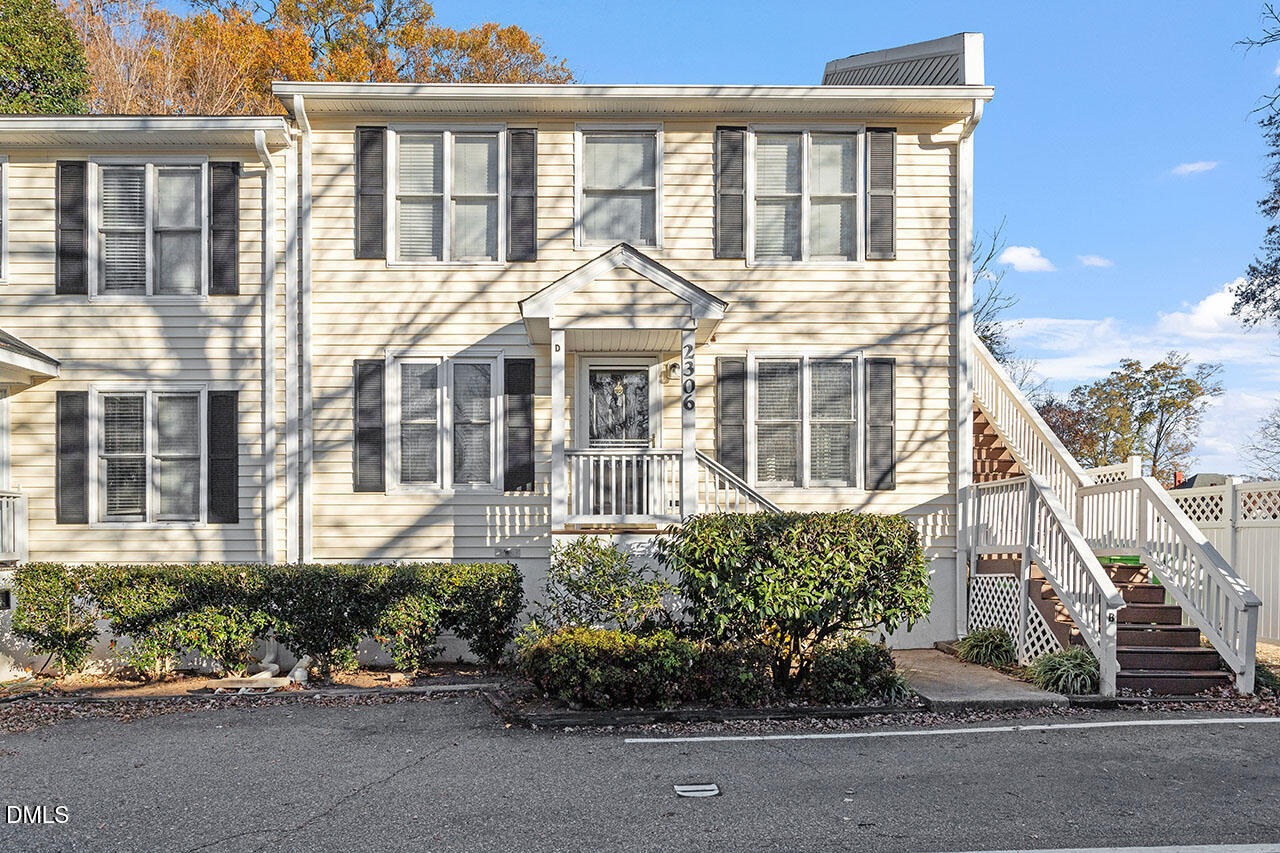 2306 Stafford Avenue, Unit D Raleigh, NC 27607 - Photo 1 of 24 front view of a brick house with a garden