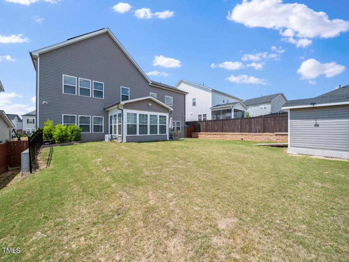 2609 Princess Tree Drive Raleigh, NC 27616 - Photo 23 of 23 a view of a house with a yard and sitting area