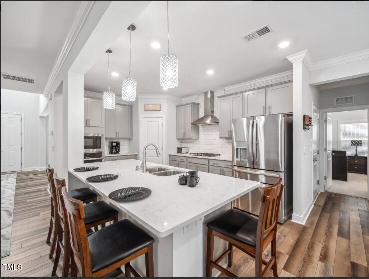 2609 Princess Tree Drive Raleigh, NC 27616 - Photo 8 of 23 a kitchen with a dining table and chairs