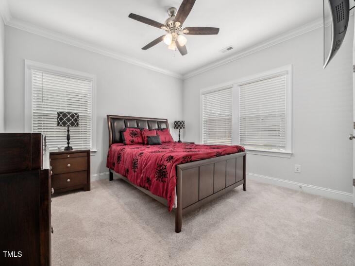 2609 Princess Tree Drive Raleigh, NC 27616 - Photo 9 of 23 a bedroom with a bed and window