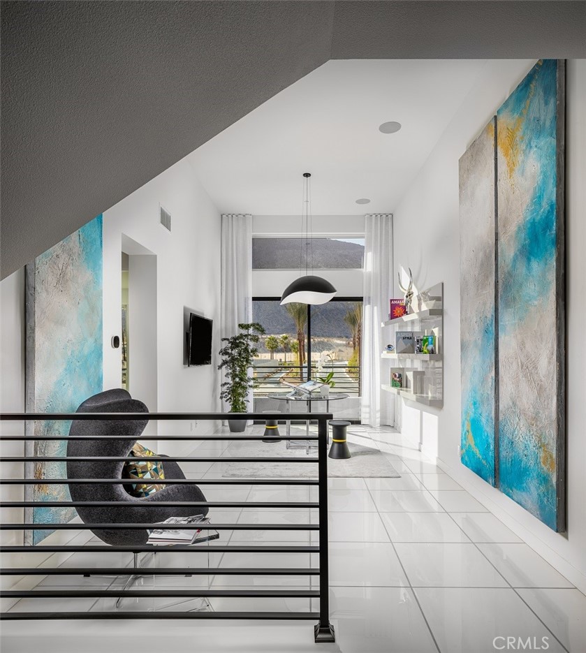 438 Huddle Spgs Way Palm Springs, CA 92264 - Photo 6 of 11 a living room with furniture and a fireplace