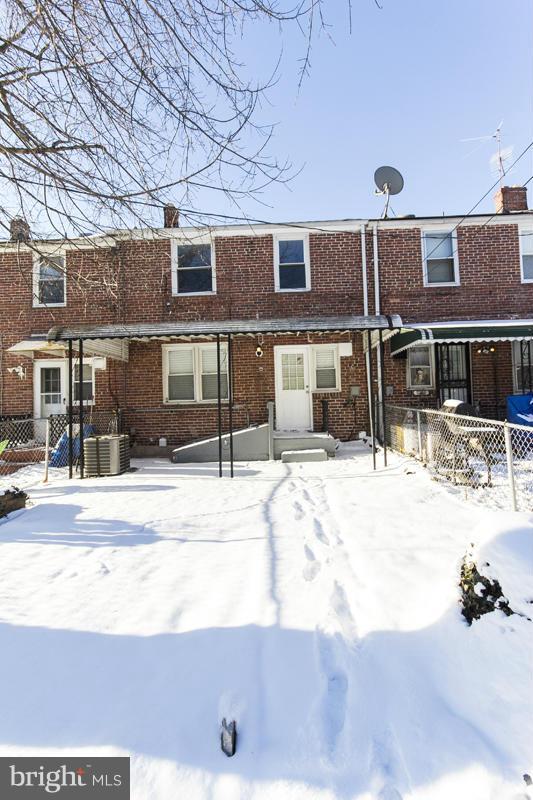 1008 Reverdy Road Baltimore, MD 21212 - Photo 14 of 29 a view of a house with a yard