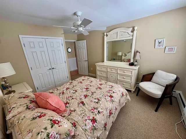 a view of a swimming pool with a lounge chairs