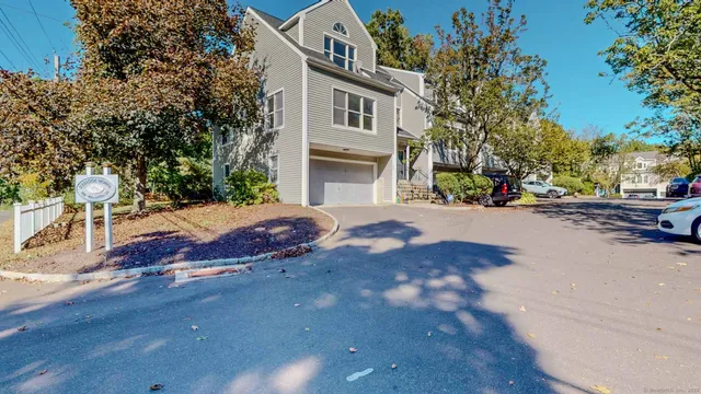 a view of a house with a street