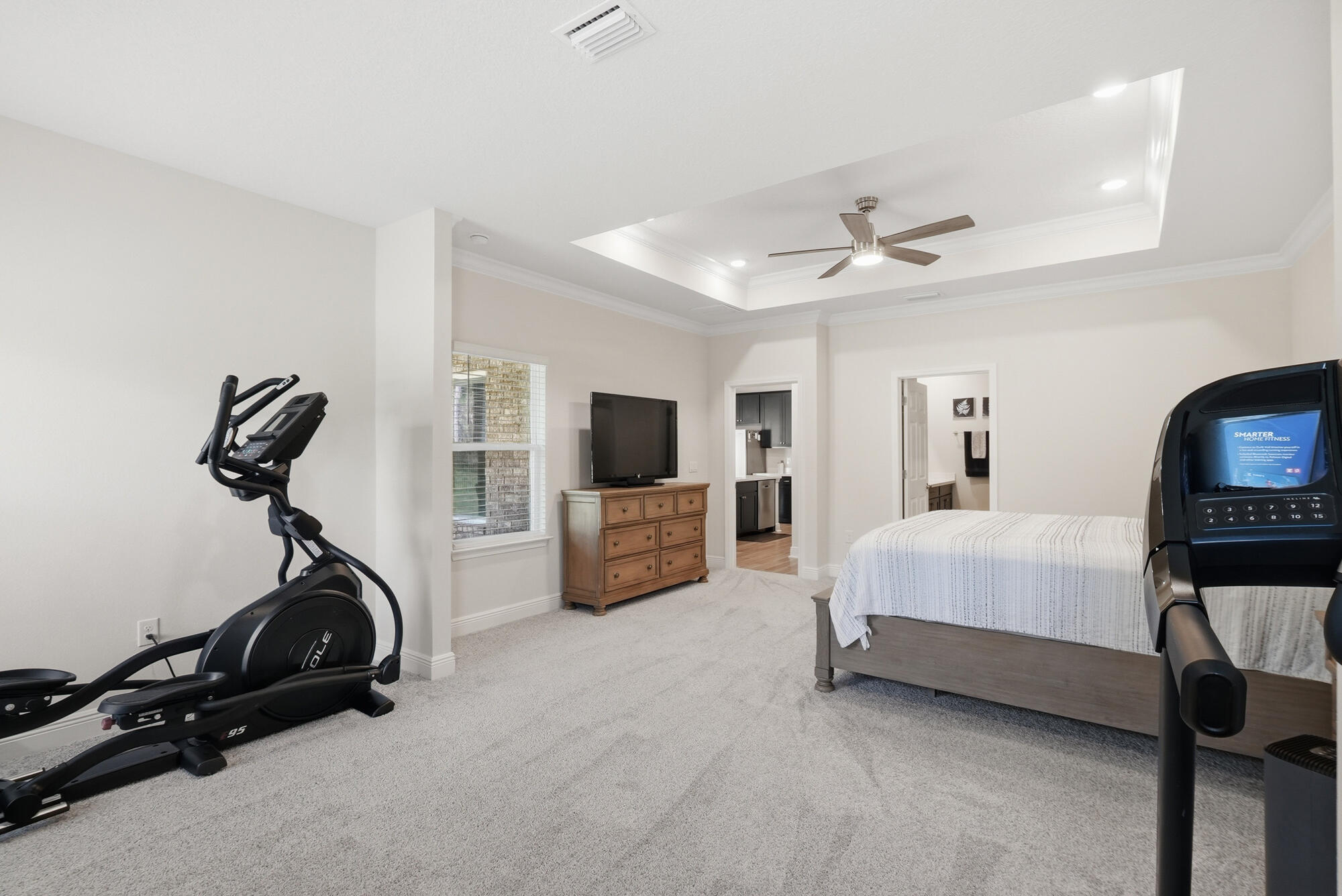 158 Bentgrass Road South Freeport, FL 32439 - Photo 21 of 66 a room with furniture a flat screen tv and a ceiling fan