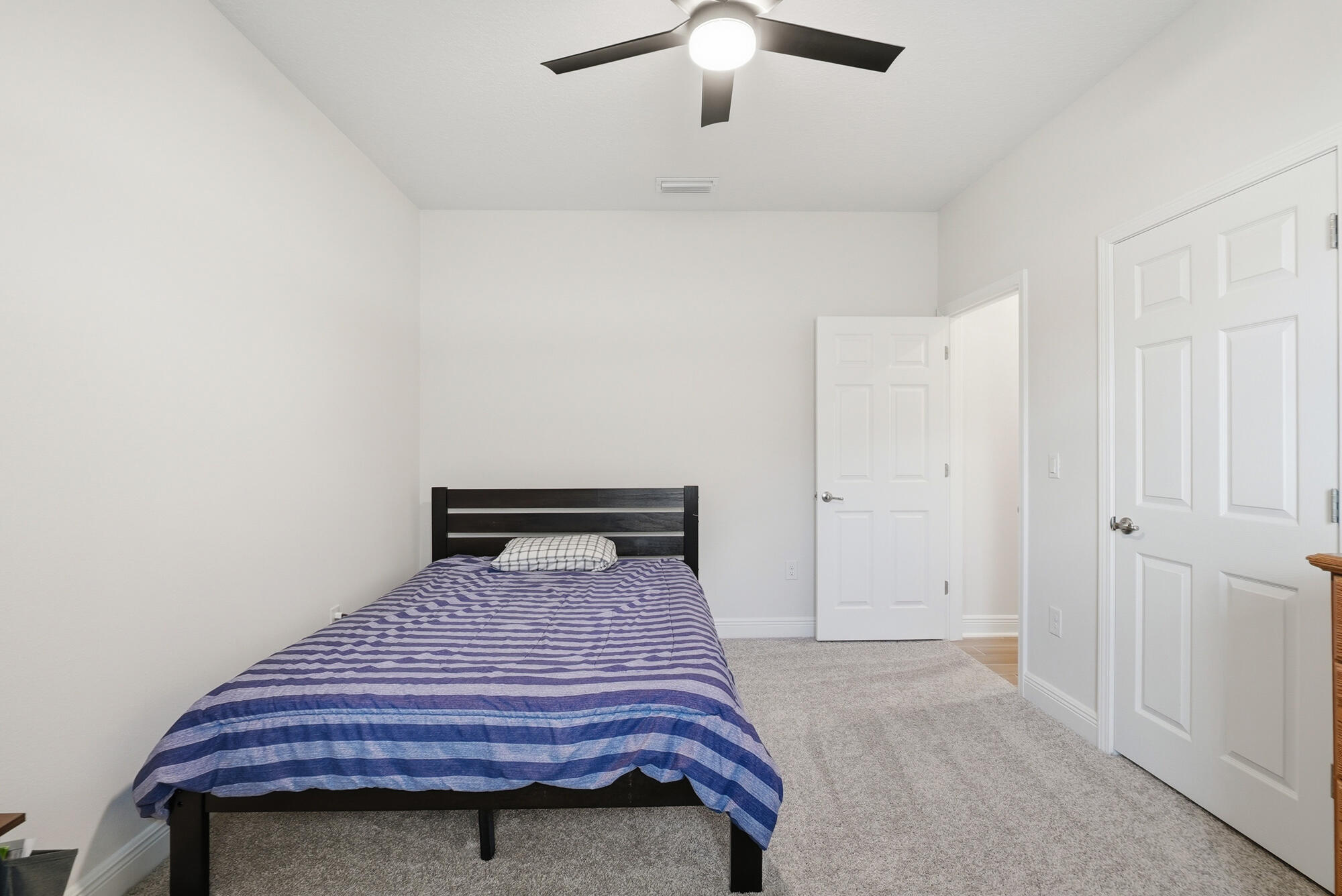 158 Bentgrass Road South Freeport, FL 32439 - Photo 28 of 66 a bedroom with a bed and ceiling fan