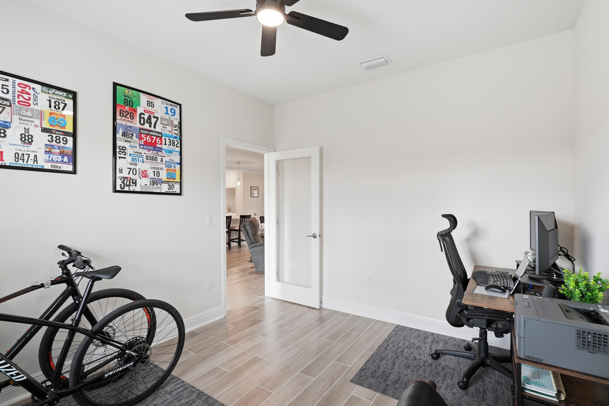 158 Bentgrass Road South Freeport, FL 32439 - Photo 30 of 66 a view of a workspace with furniture and a potted plant