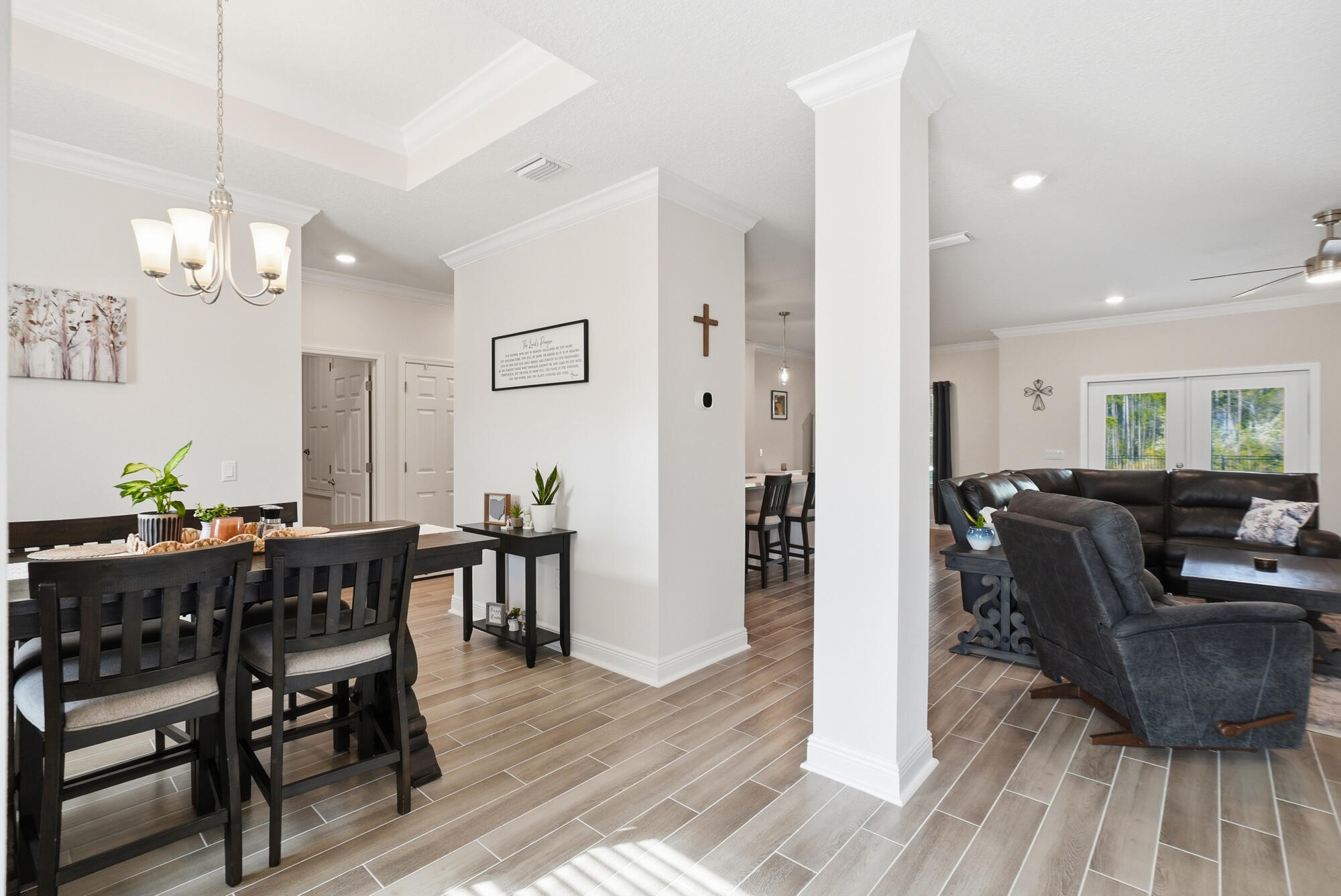 158 Bentgrass Road South Freeport, FL 32439 - Photo 3 of 66 a view of a dining room with furniture and wooden floor