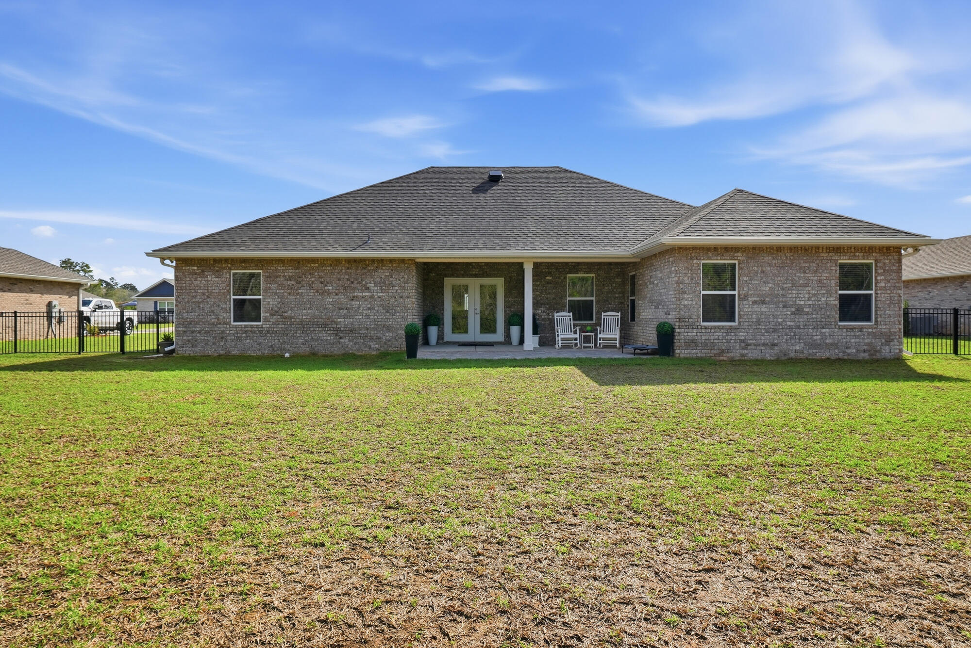 158 Bentgrass Road South Freeport, FL 32439 - Photo 42 of 66 a front view of a house with a yard