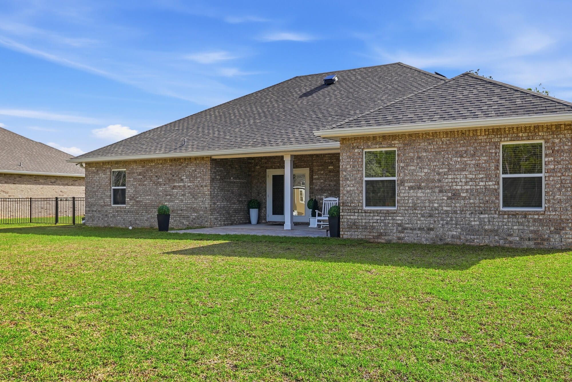 158 Bentgrass Road South Freeport, FL 32439 - Photo 43 of 66 a view of a house with a swimming pool and a yard