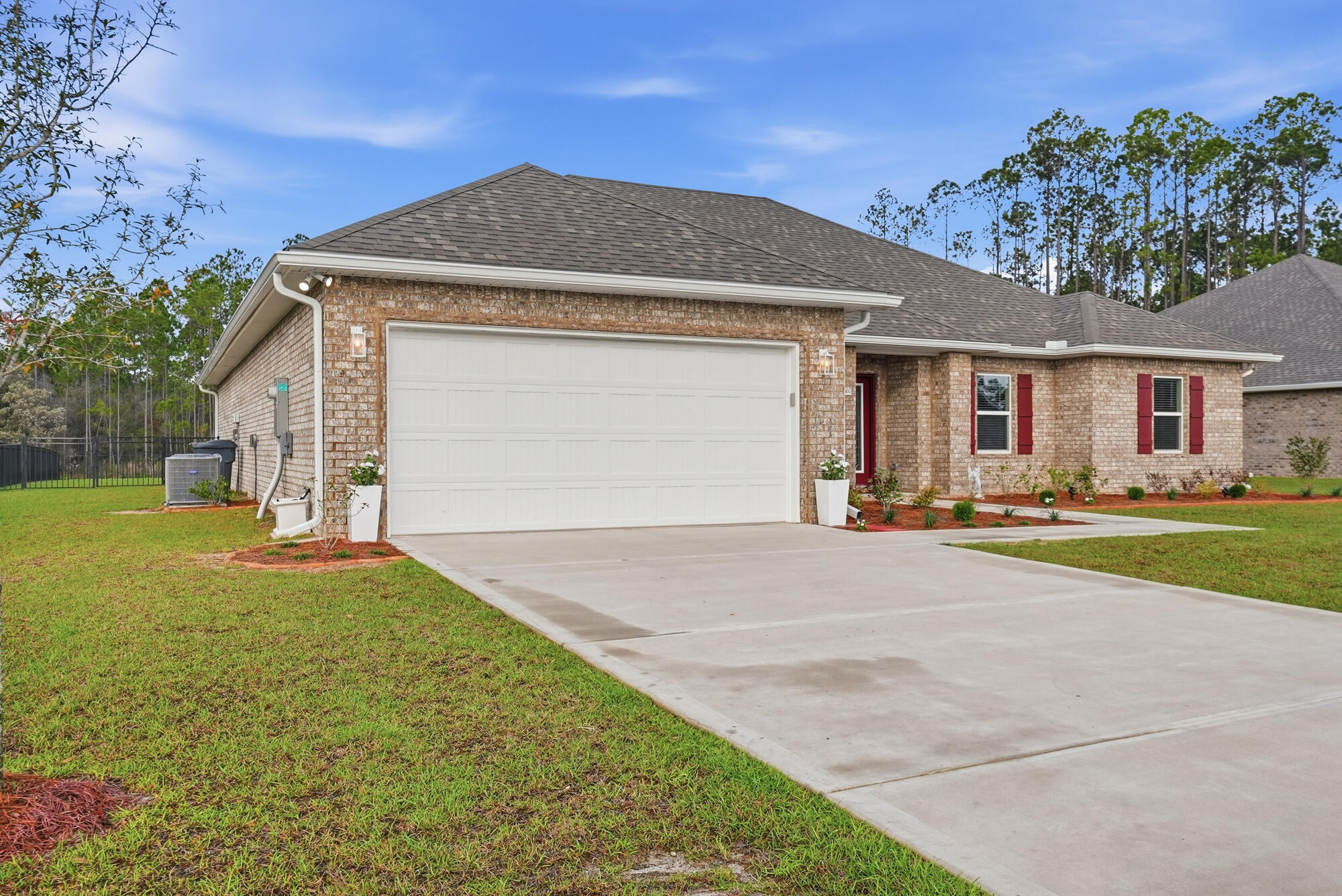 158 Bentgrass Road South Freeport, FL 32439 - Photo 63 of 66 a front view of house with yard and trees