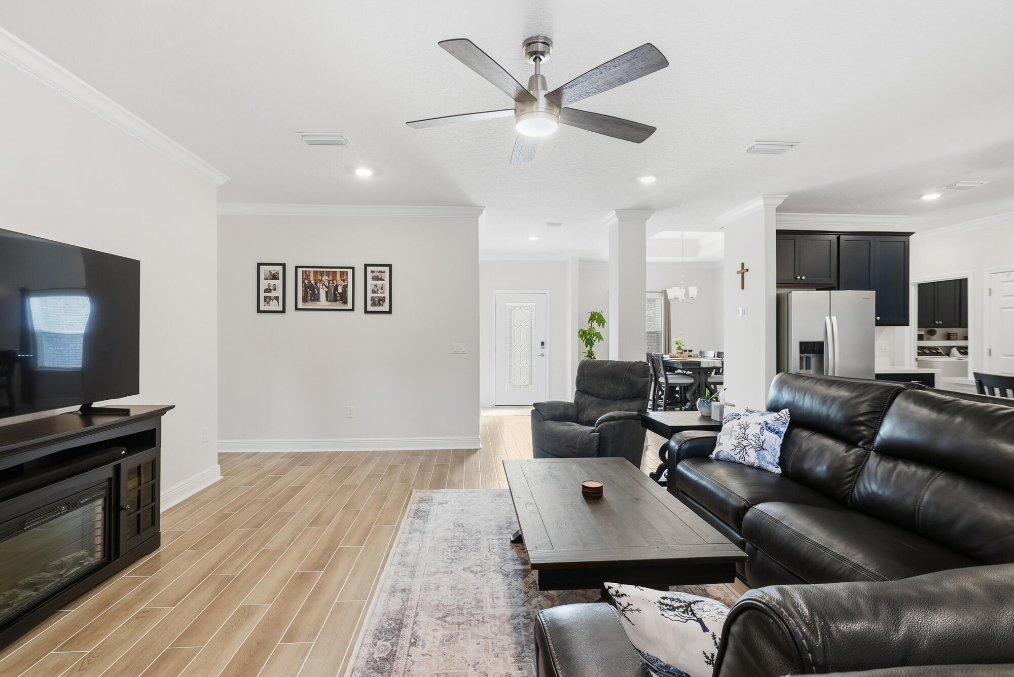 158 Bentgrass Road South Freeport, FL 32439 - Photo 10 of 66 a living room with furniture and a flat screen tv with kitchen view
