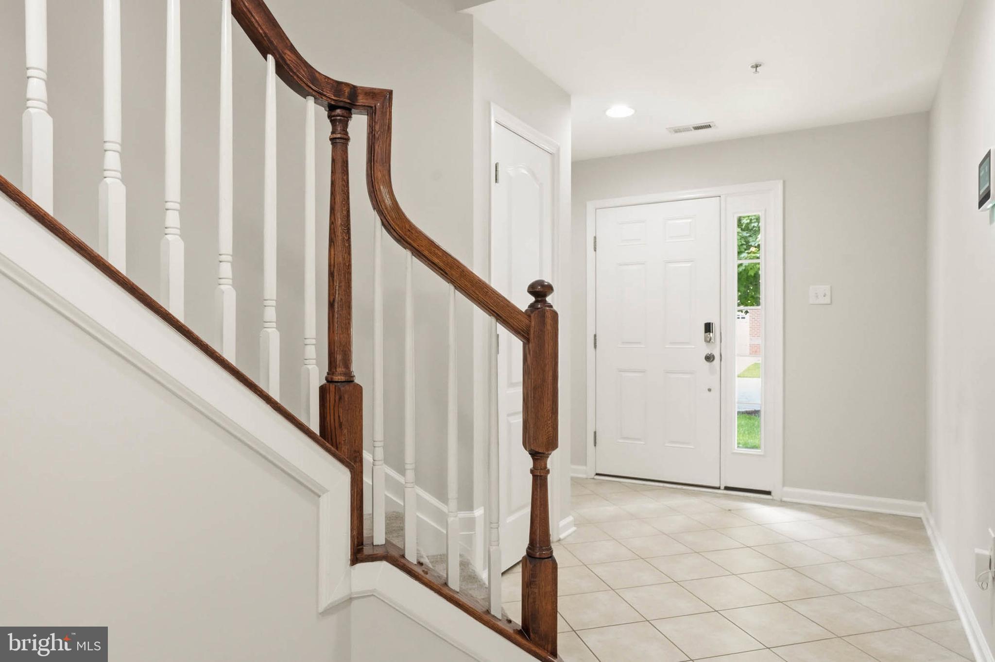 9817 Solar Course Laurel, MD 20723 - Photo 28 of 59 a view of an entryway with staircase