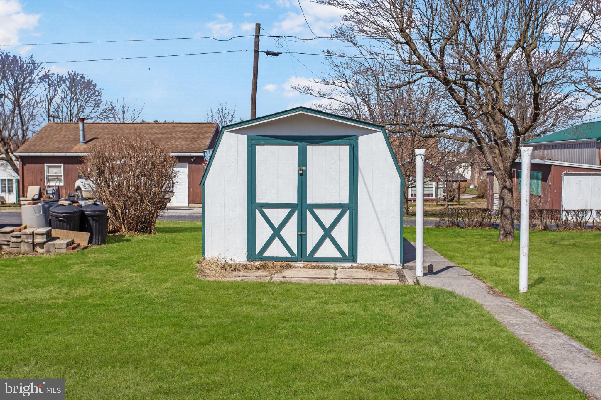 235 Ridge Avenue McSherrystown, PA 17344 - Photo 22 of 26 a front view of a house with garden