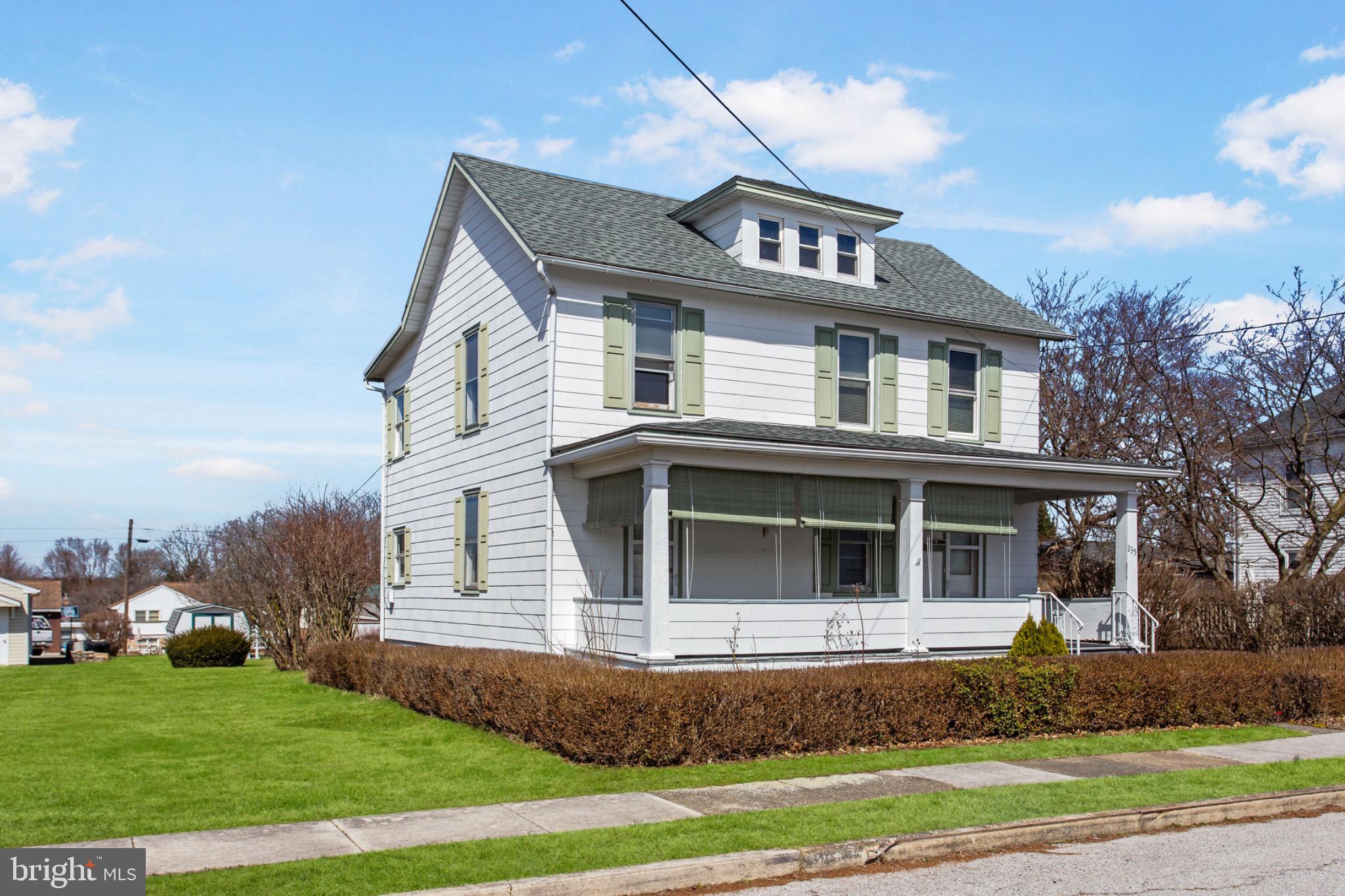 235 Ridge Avenue McSherrystown, PA 17344 - Photo 3 of 26 a front view of a house with a yard