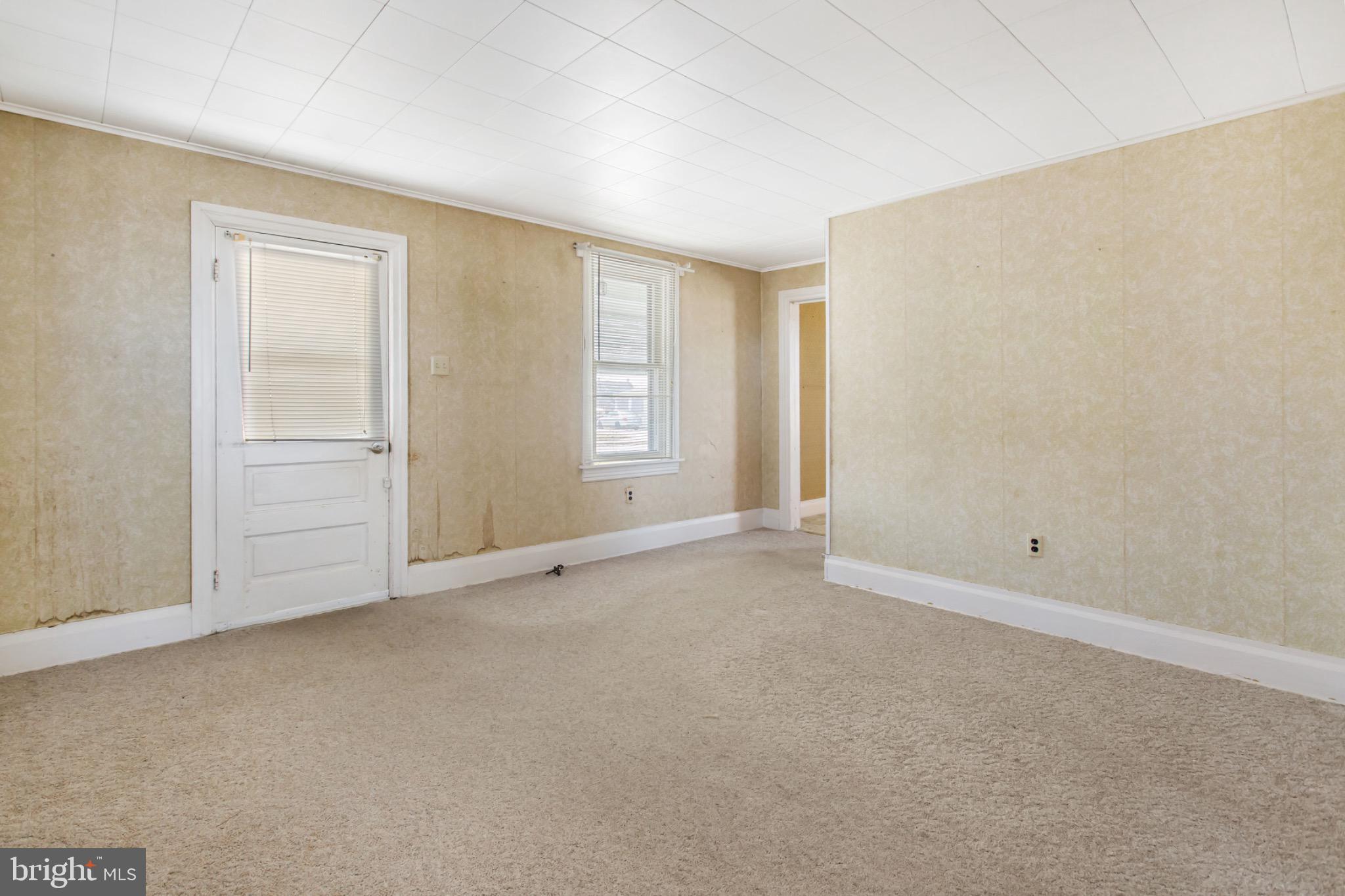 235 Ridge Avenue McSherrystown, PA 17344 - Photo 4 of 26 an empty room with windows