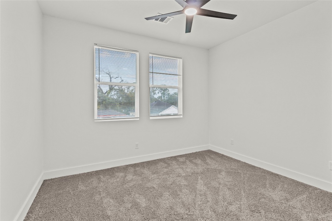 8129 Hoffman Street Houston, TX 77016 - Photo 14 of 18 an empty room with a window