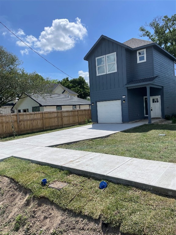 8129 Hoffman Street Houston, TX 77016 - Photo 2 of 18 a view of a house with a backyard