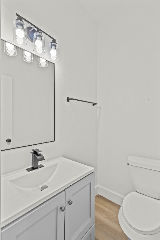 8129 Hoffman Street Houston, TX 77016 - Photo 4 of 18 a bathroom with a sink vanity and toilet