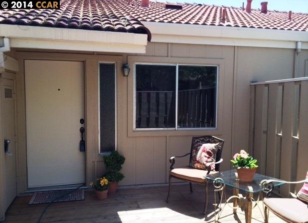 4430 Eagle Peak Road, Unit B Concord, CA 94521 - Photo 1 of 1 a front view of a house with outdoor seating