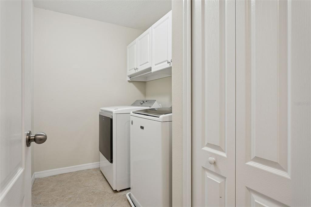 9568 Trumpet Vine Loop Trinity, FL 34655 - Photo 22 of 25 a utility room with dryer and washer