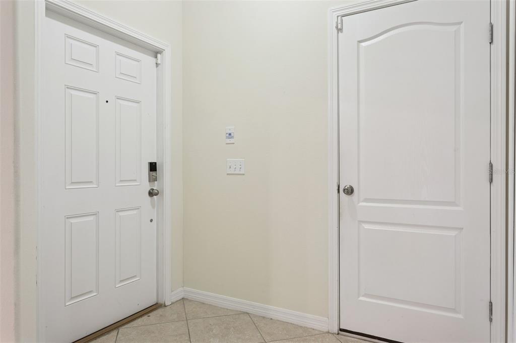 9568 Trumpet Vine Loop Trinity, FL 34655 - Photo 4 of 25 a view of a closet area