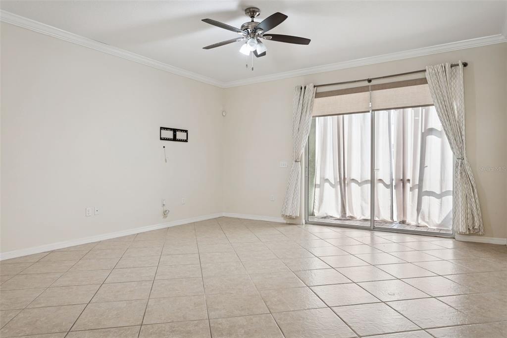 9568 Trumpet Vine Loop Trinity, FL 34655 - Photo 9 of 25 a view of an empty room with a window