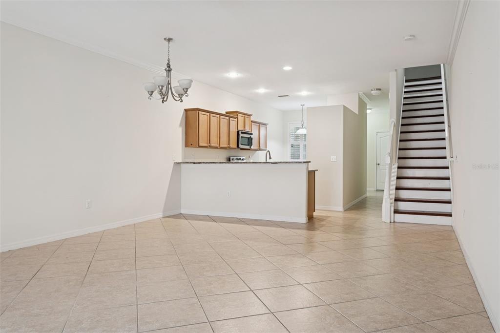 9568 Trumpet Vine Loop Trinity, FL 34655 - Photo 10 of 25 a view of a kitchen with a sink and a kitchen in it
