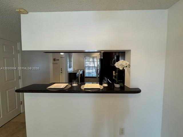 192 Southwest 96th Avenue, Unit 192 Plantation, FL 33324 - Photo 8 of 15 a room with a table and chairs