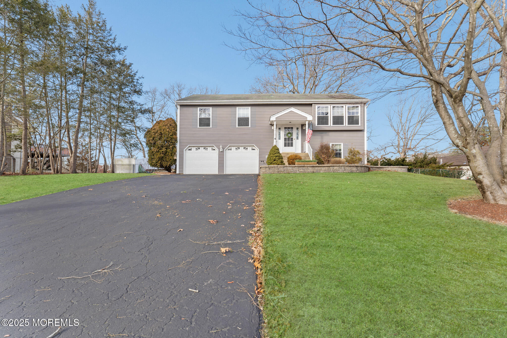 4 Yorkshire Drive Jackson, NJ 08527 - Photo 2 of 58 front view of a house with a yard