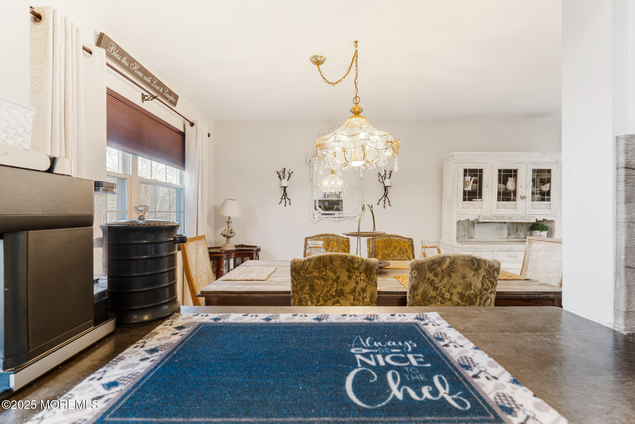 4 Yorkshire Drive Jackson, NJ 08527 - Photo 23 of 58 a living room with furniture and a chandelier