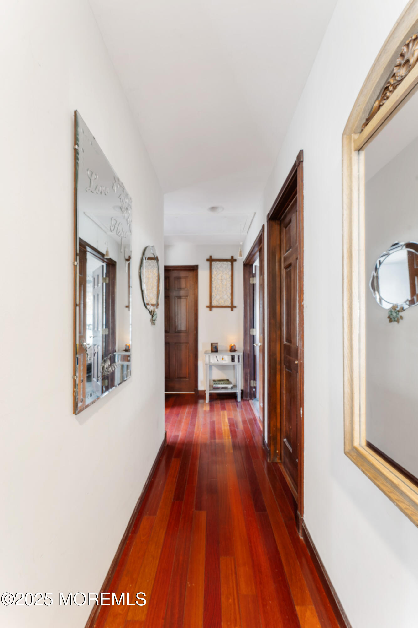 4 Yorkshire Drive Jackson, NJ 08527 - Photo 27 of 58 a view of a hallway with wooden floor and furniture