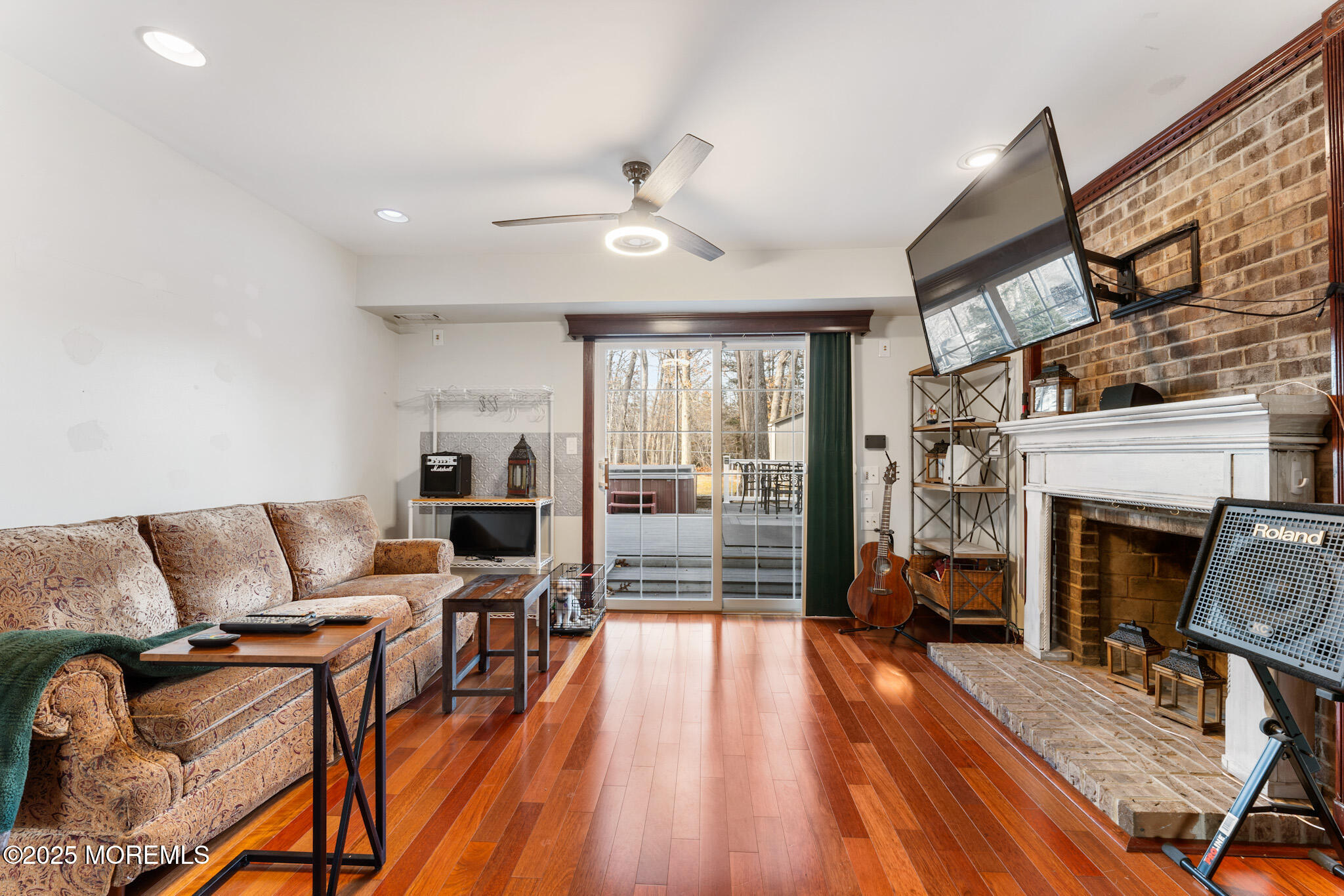 4 Yorkshire Drive Jackson, NJ 08527 - Photo 35 of 58 a living room with furniture and a fireplace