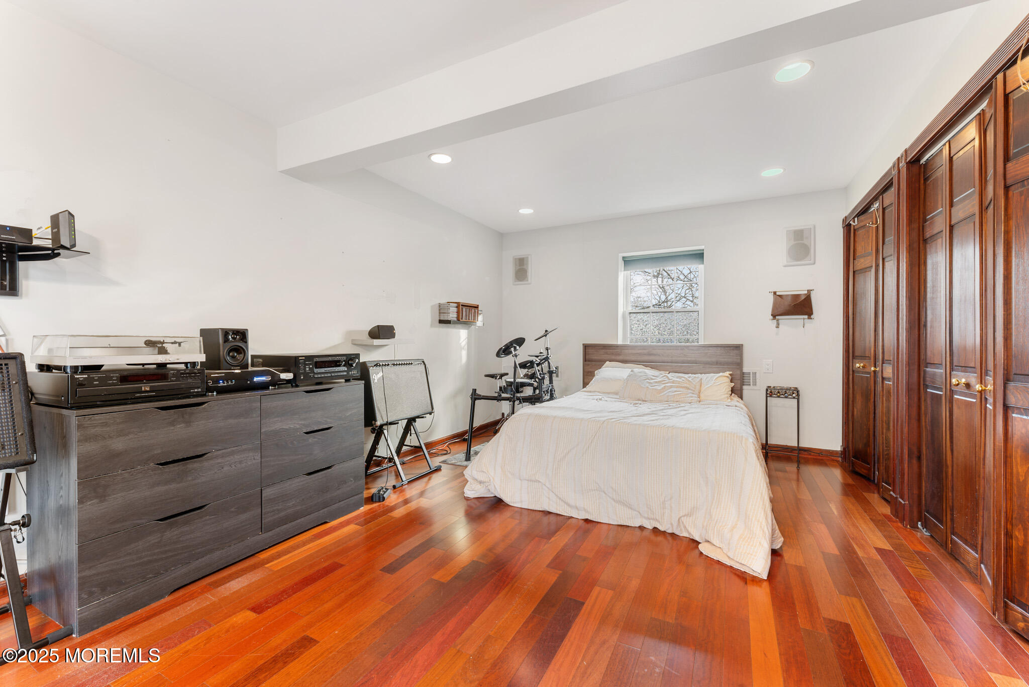 4 Yorkshire Drive Jackson, NJ 08527 - Photo 37 of 58 a bed room with a bed and mirror