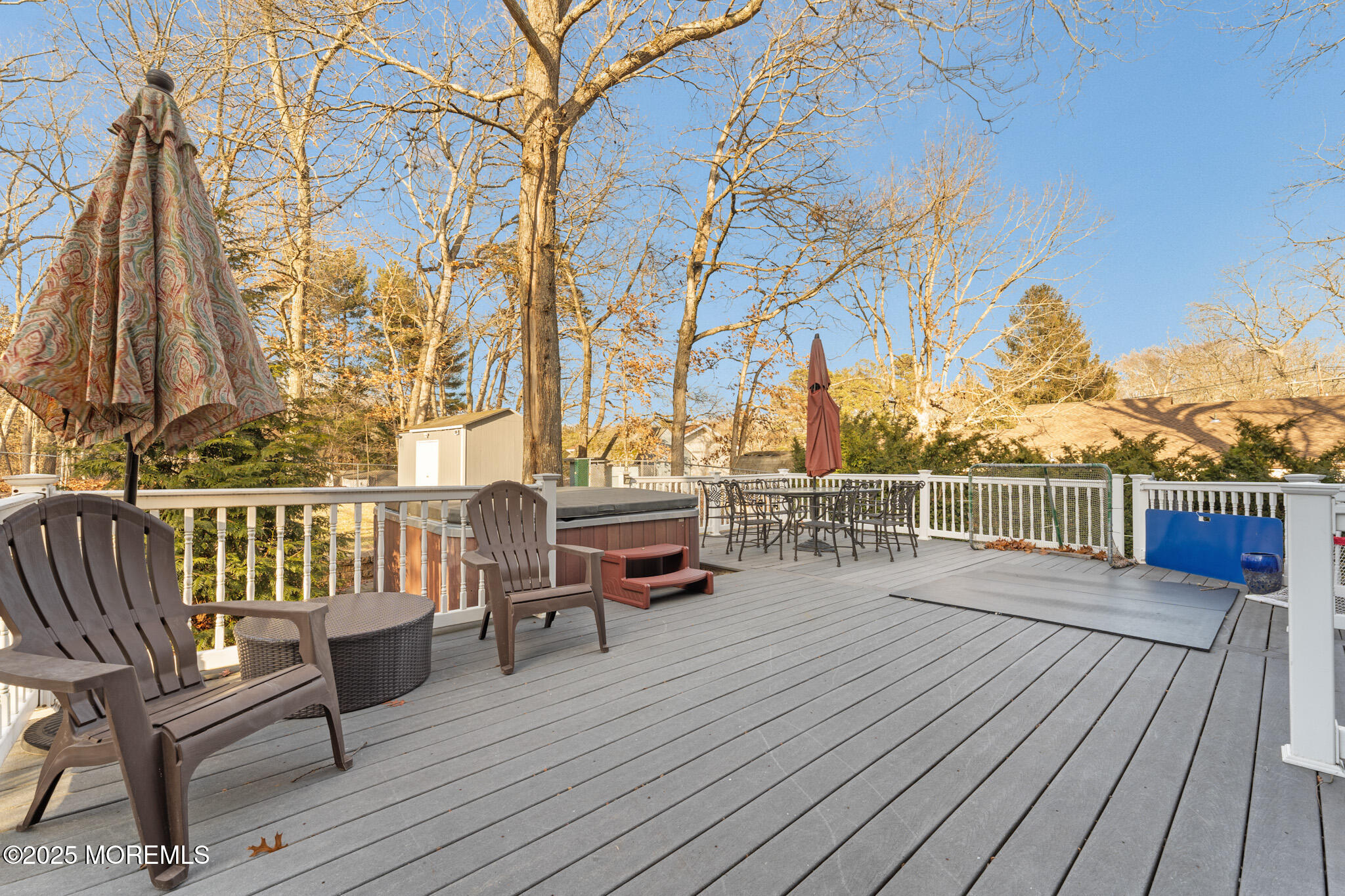4 Yorkshire Drive Jackson, NJ 08527 - Photo 41 of 58 a balcony with wooden floor and fence