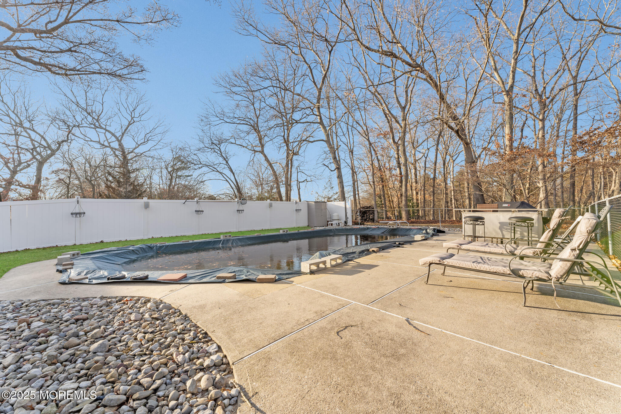 4 Yorkshire Drive Jackson, NJ 08527 - Photo 49 of 58 a view of a backyard with snow on the road