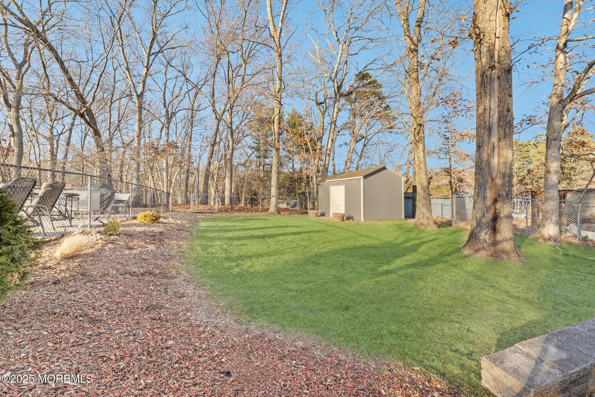 4 Yorkshire Drive Jackson, NJ 08527 - Photo 54 of 58 a backyard of a house with lots of green space