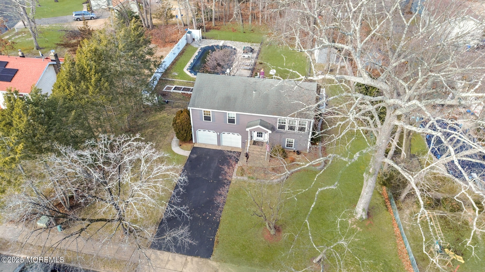 4 Yorkshire Drive Jackson, NJ 08527 - Photo 58 of 58 an aerial view of a house with a yard