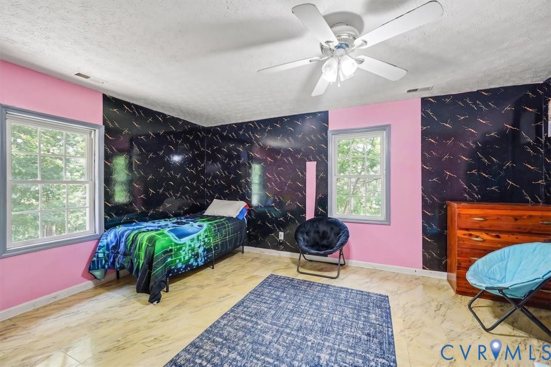 62 The Fls Road Victoria, VA 23974 - Photo 17 of 36 Room featuring wood-finish flooring, a ceiling fan