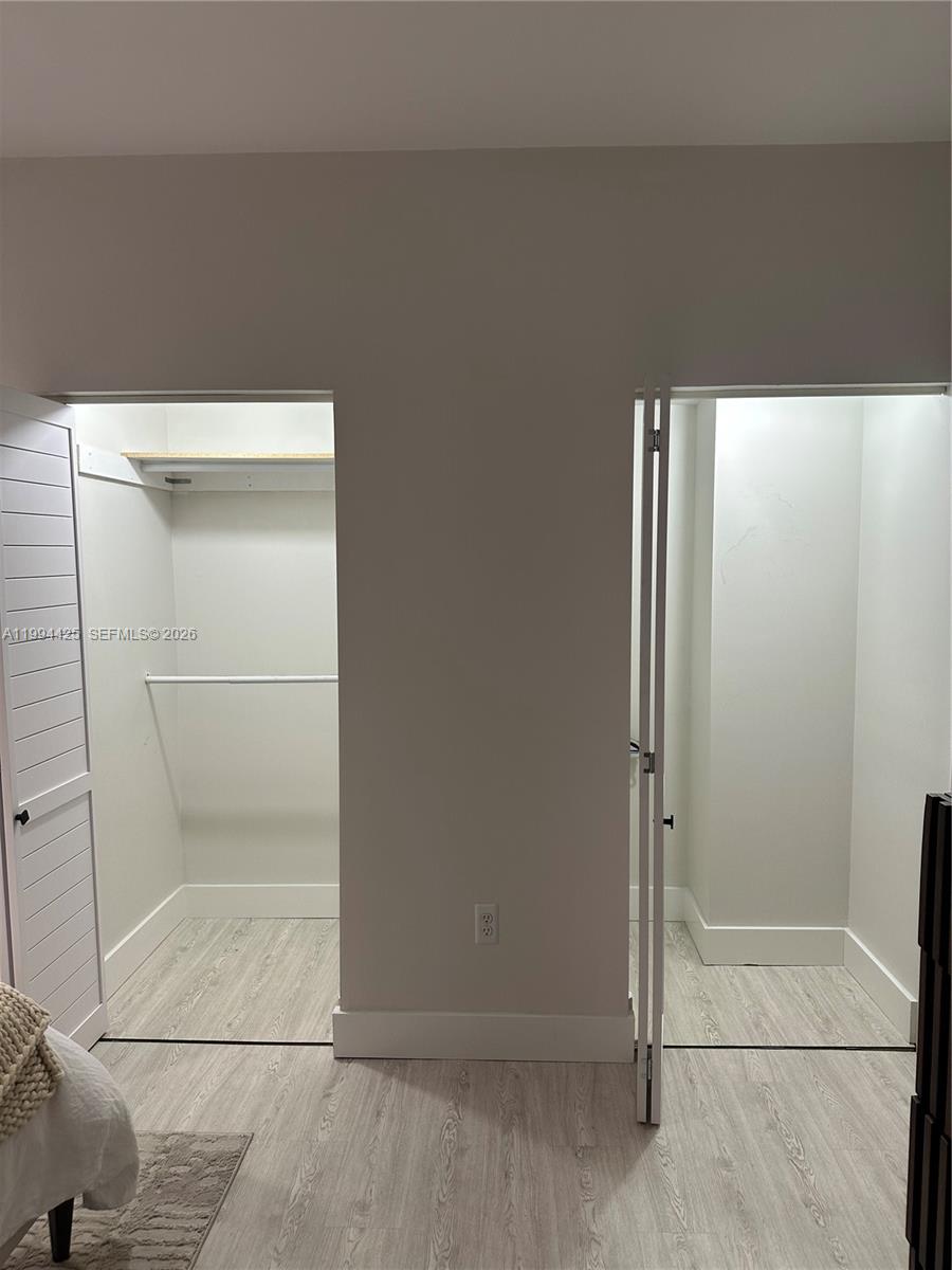 3339 Virginia Street, Unit 127 Miami, FL 33133 - Photo 21 of 25 a bathroom with a glass shower door