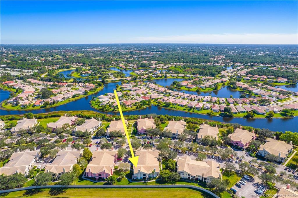 160 Southwest Peacock Boulevard, Unit 31203 Port St. Lucie, FL 34986 - Photo 2 of 43 a view of a city