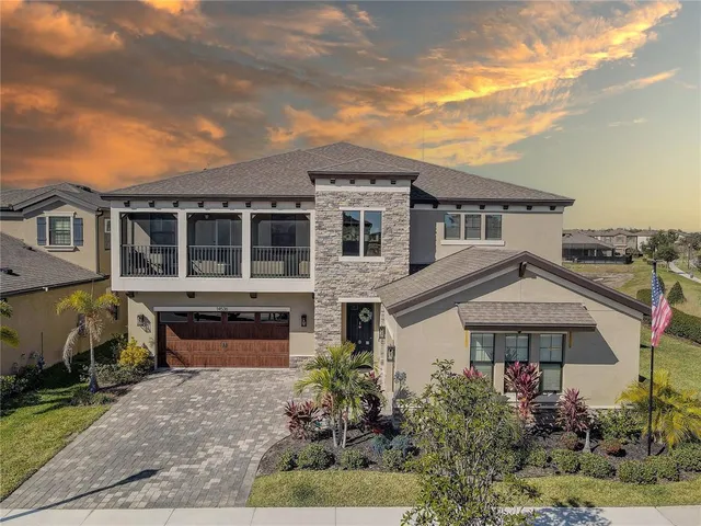front view of a house with a garden