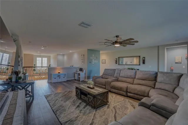 a spacious bathroom with a double vanity sink a mirror and a shower