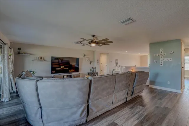 a bathroom with a tub a sink and a shower