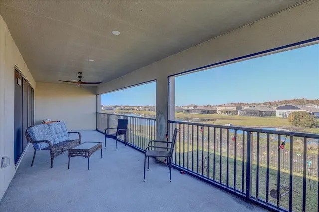 a bathroom with a sink double vanity granite tub shower and a mirror