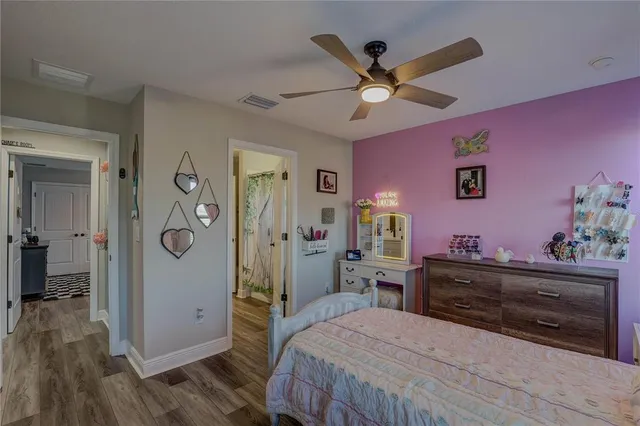 an aerial view of a house with a swimming pool